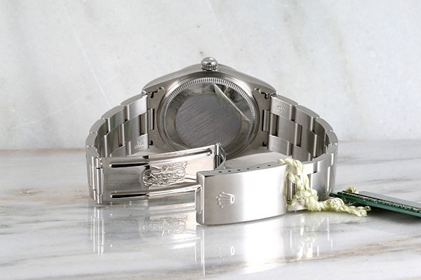 Rolex 14000 34mm 100m / 330ft (suitable for swimming and shallow snorkeling; unsuitable for diving) Water Resistant Watch